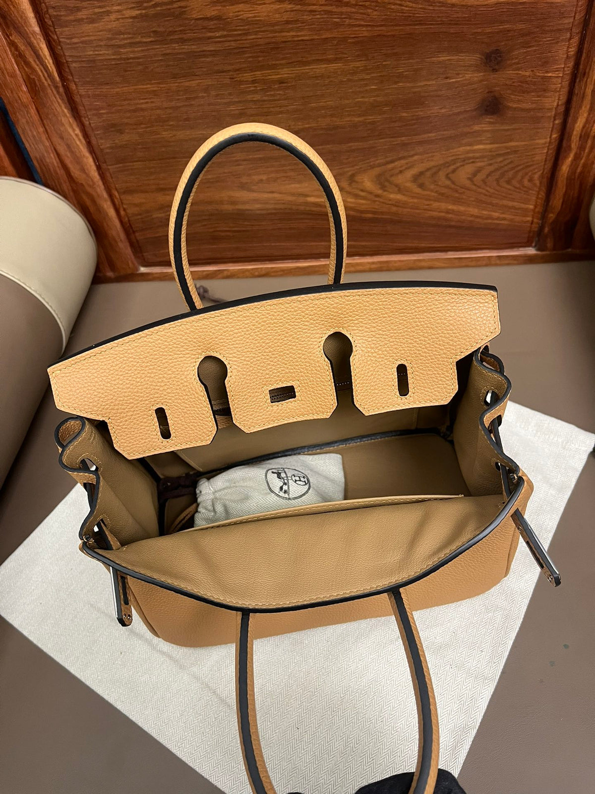 Classic Tan Leather Satchel Handbag with Silver Hardware and Top Handles