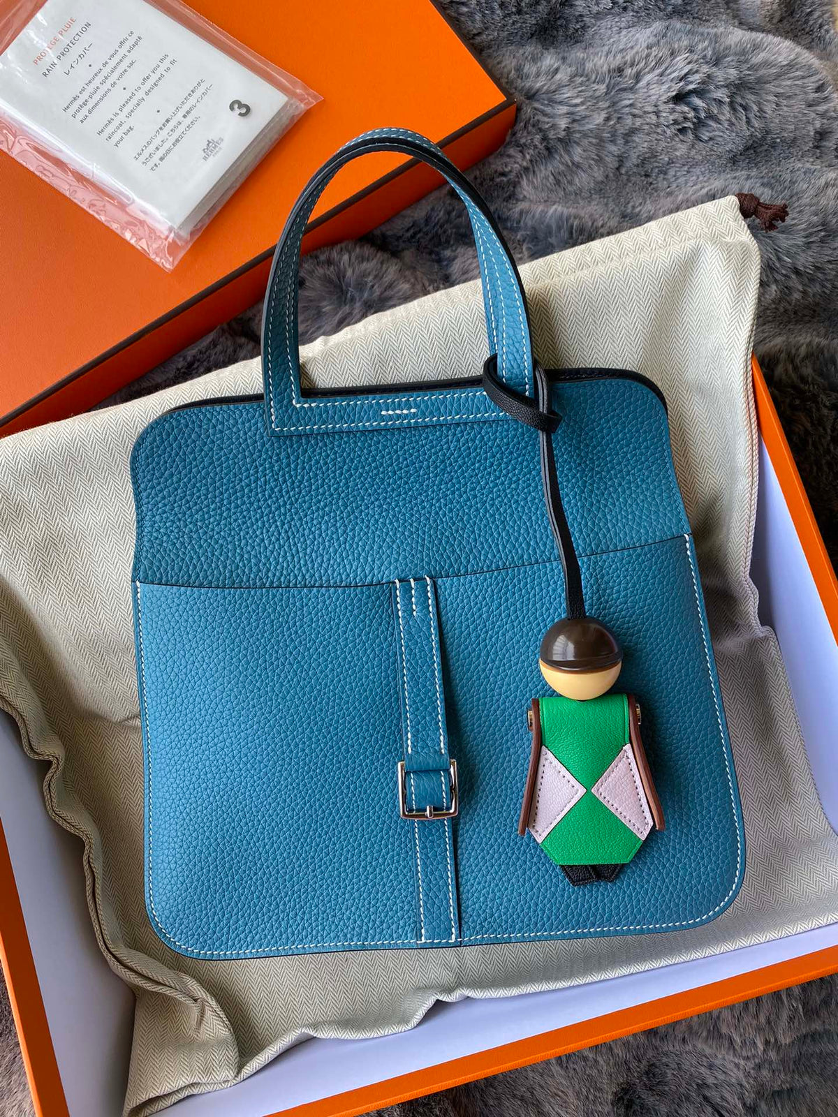Hermès Blue Leather Halzan Style Handbag with Charm in Signature Box