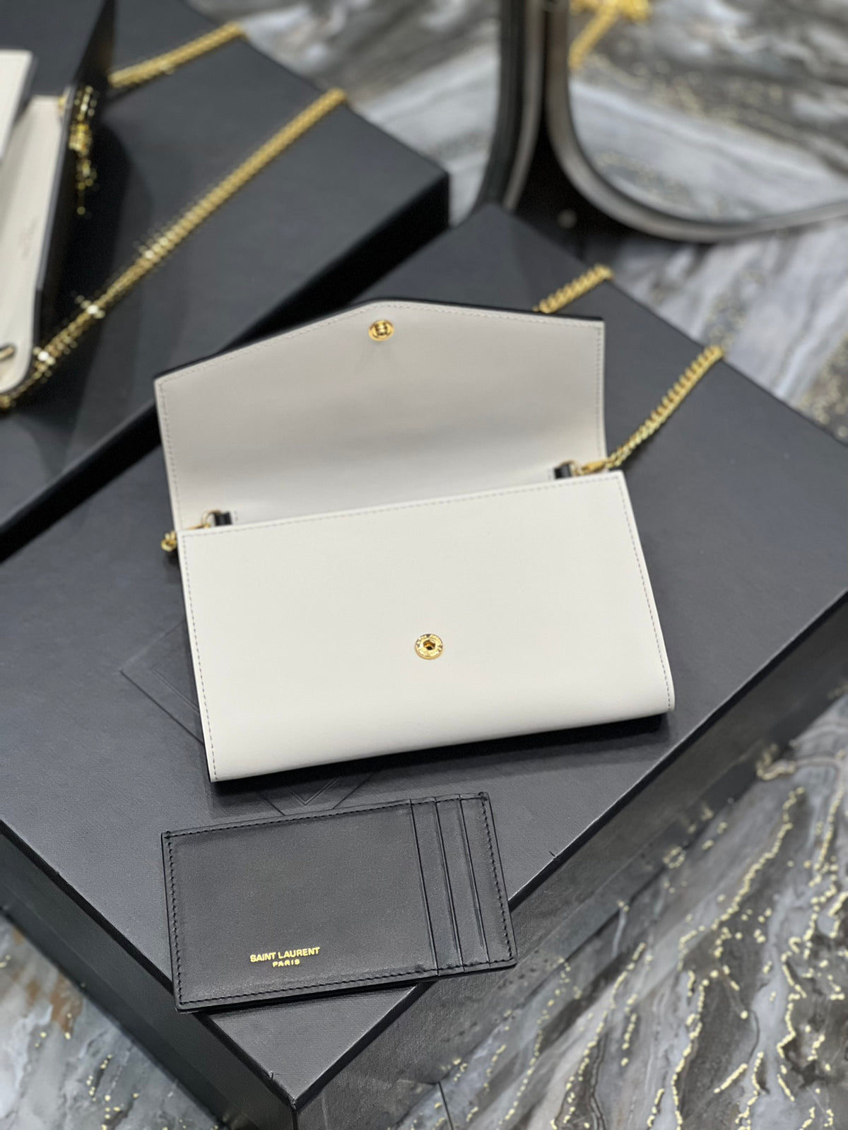 Saint Laurent Uptown Chain Wallet in Black and White Leather