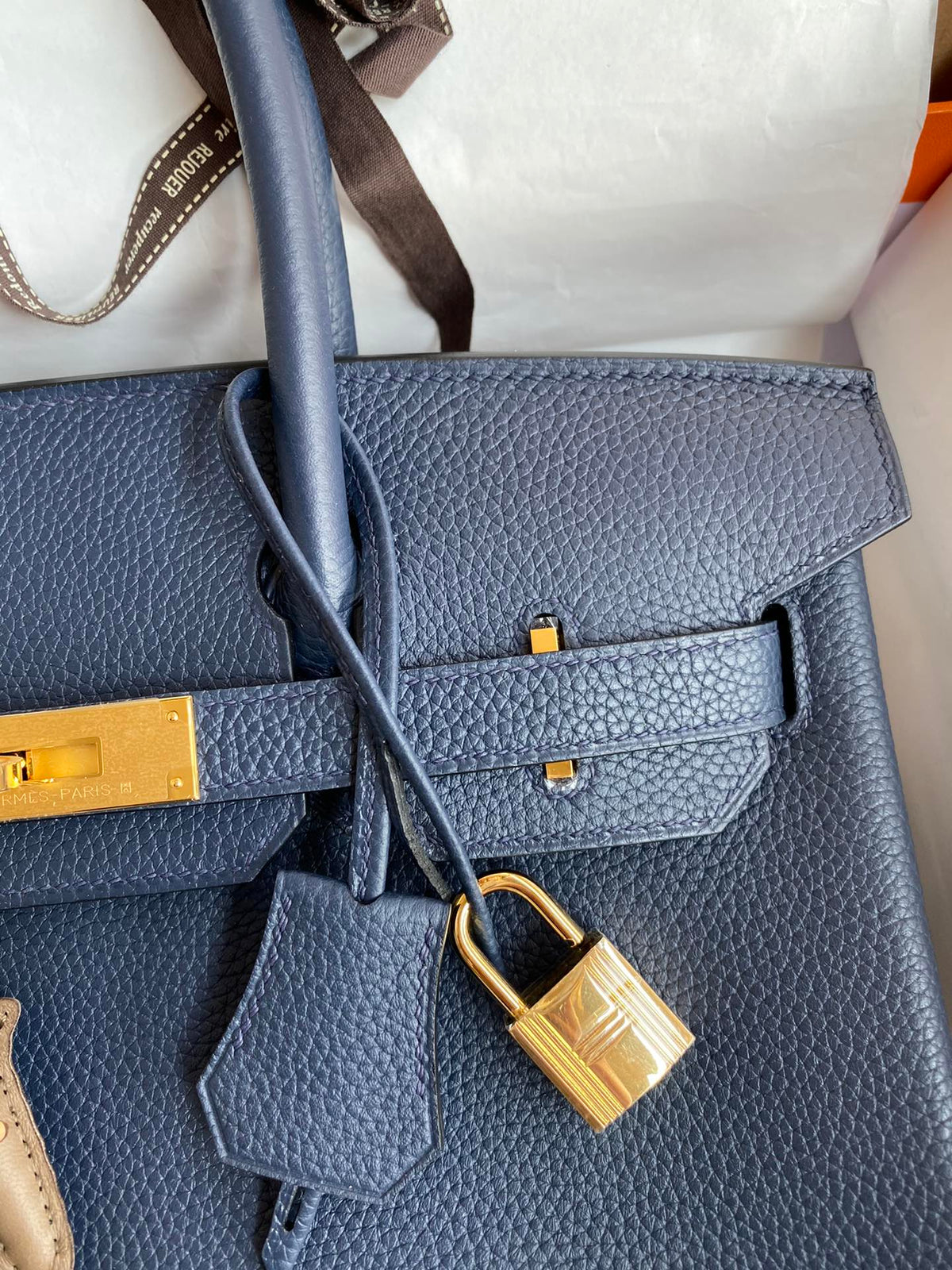 Navy Blue Leather Top-Handle Handbag with Gold Hardware and Horse Charm