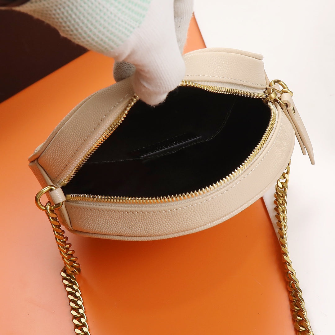 Yves Saint Laurent Vinyle Round Camera Bag in Matelassé Grain de Poudre Leather - Beige