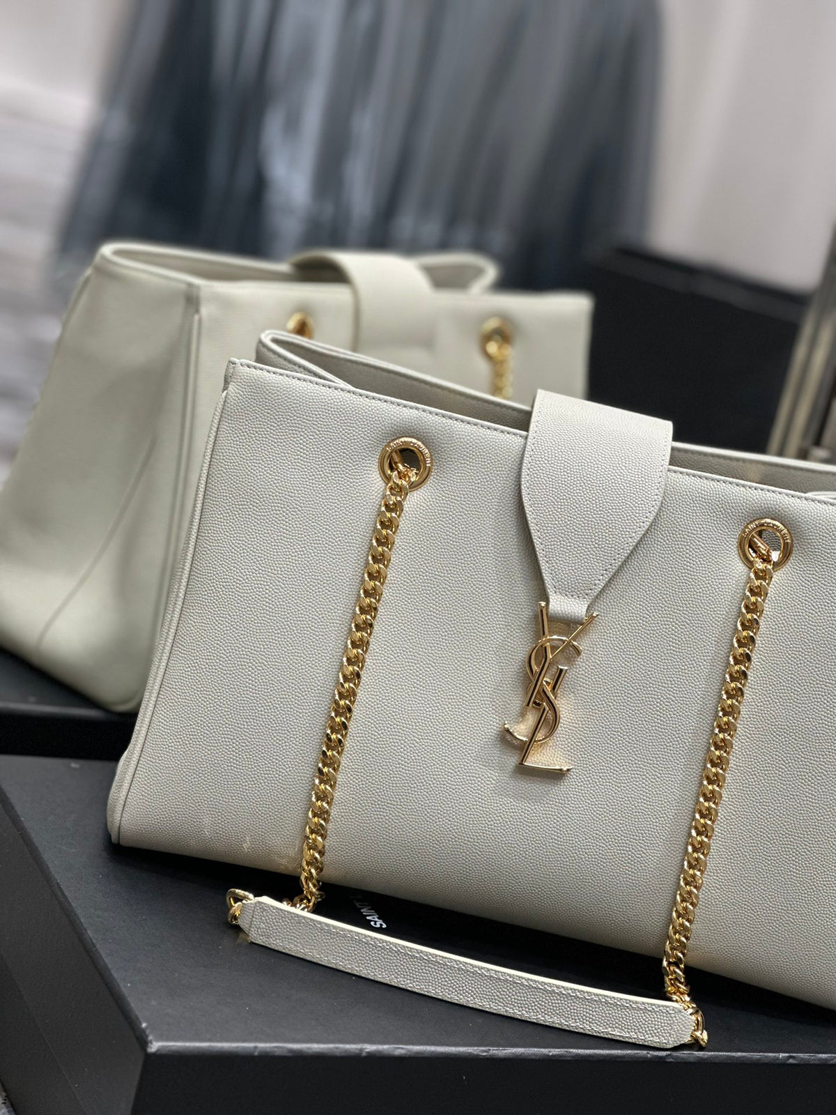 Luxury Off-White Leather Shoulder Bag with Gold Chain and Tassel