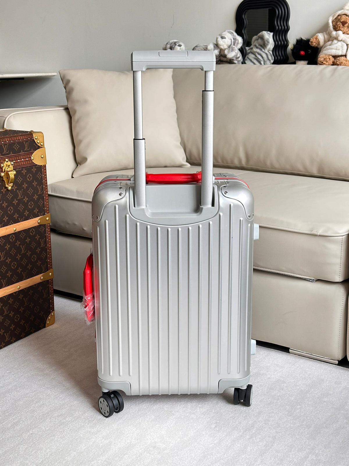 Silver Ribbed Hardside Spinner Suitcase with Red Accent Handle