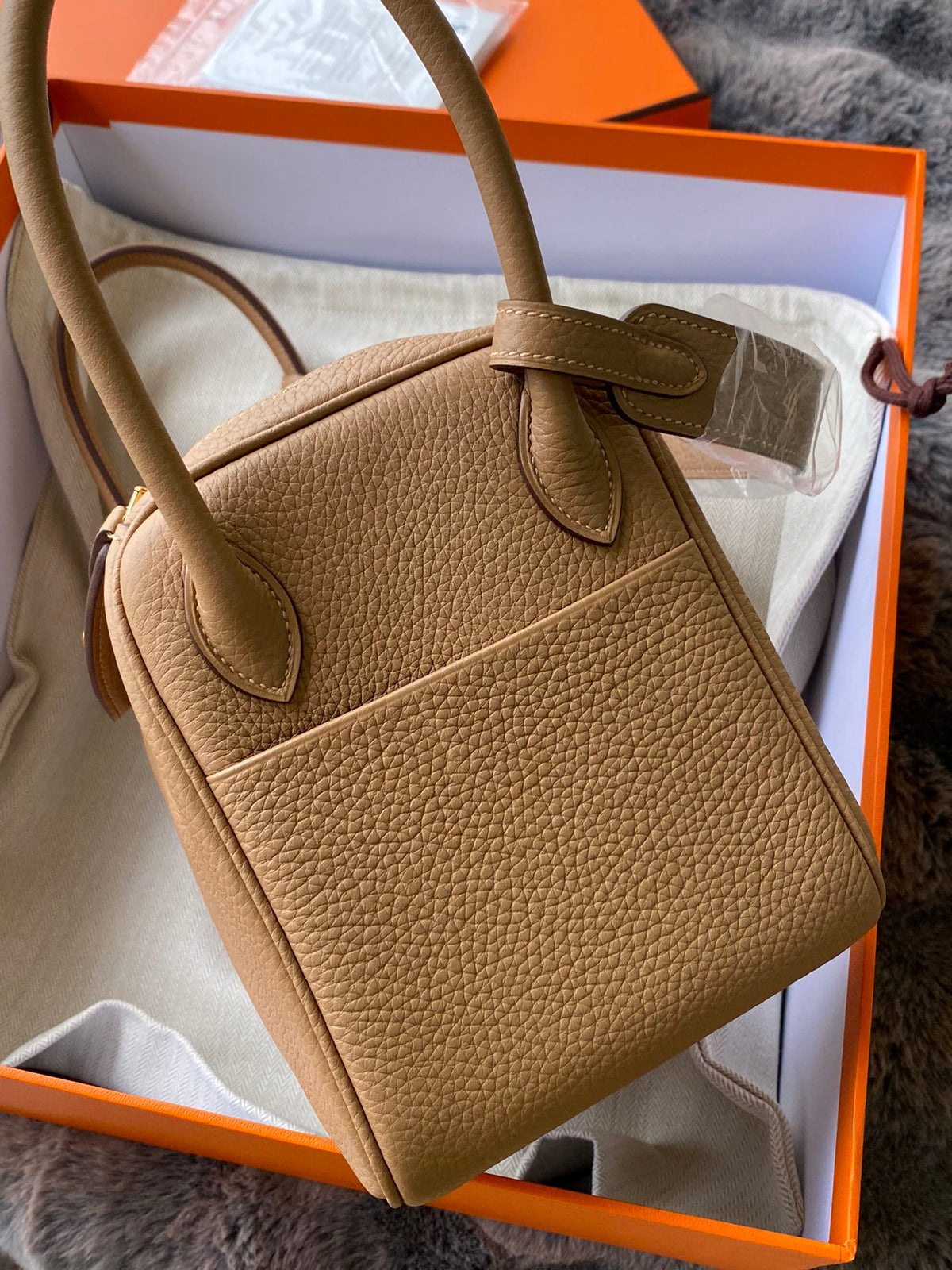 Hermès Lindy Handbag in Tan Leather with Gold-Tone Hardware