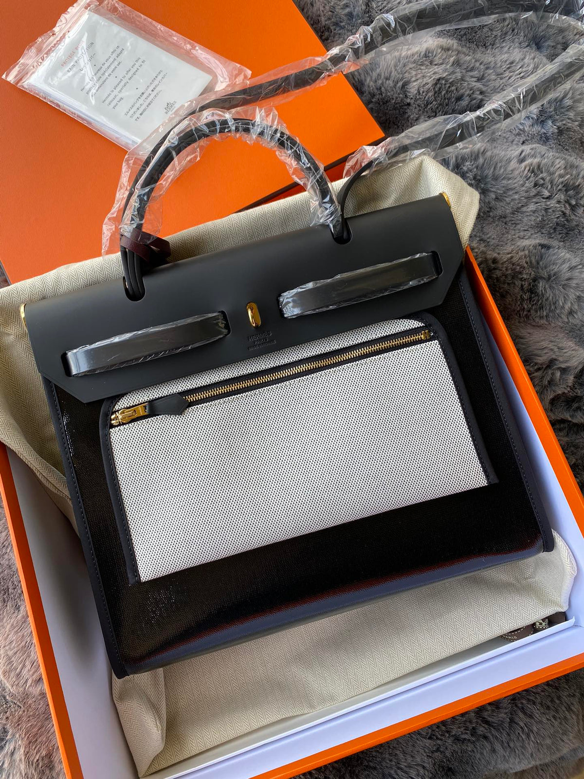 Classic Black Leather Top-Handle Handbag - Gold-Tone Hardware &amp; Geometric Charm Accessory
