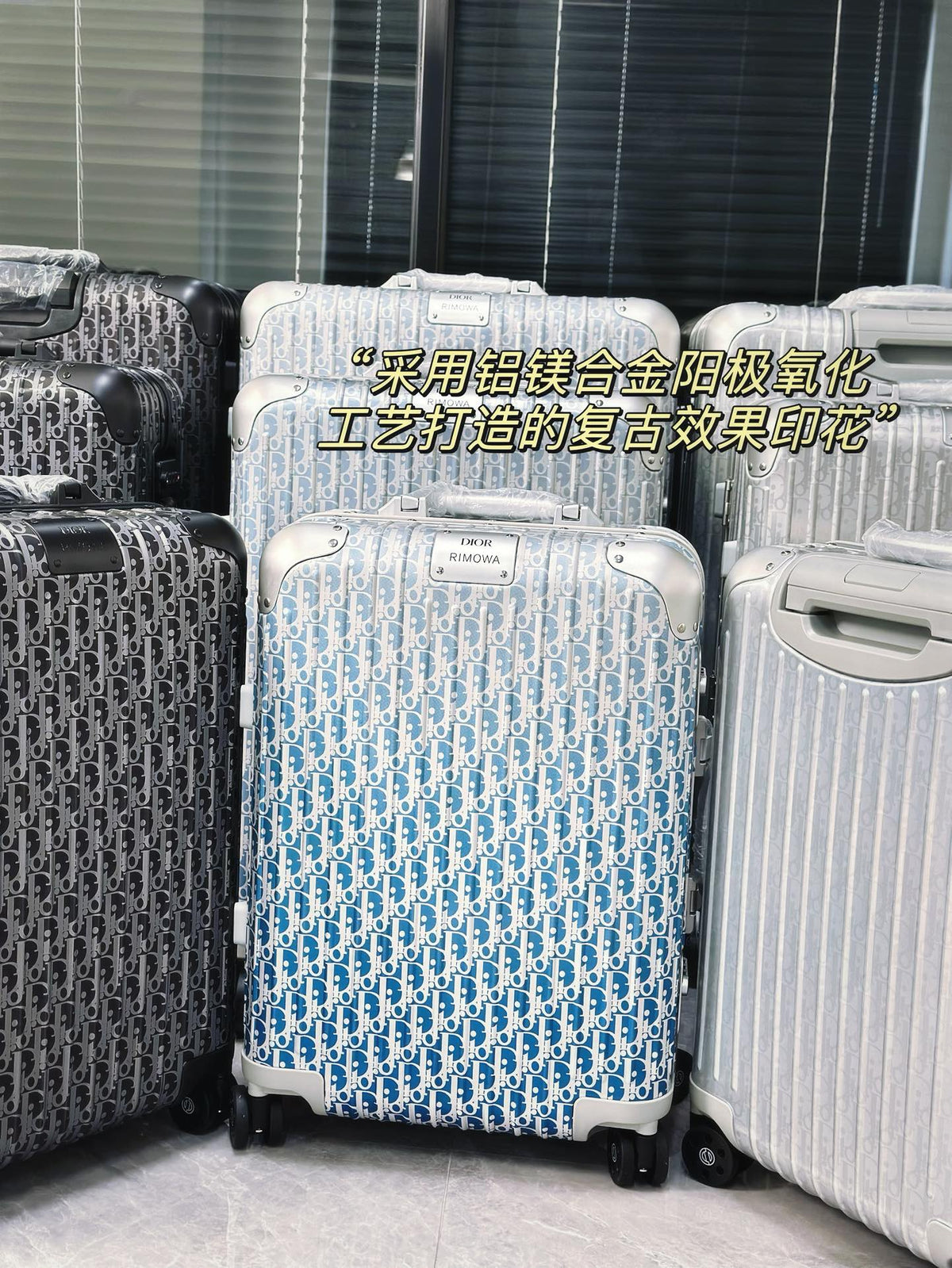 Silver Aluminum Hardside Spinner Suitcase with Monogram Pattern